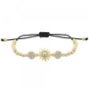 Pulsera Eguzkilore Bolitas Plata Dorada y Macramé